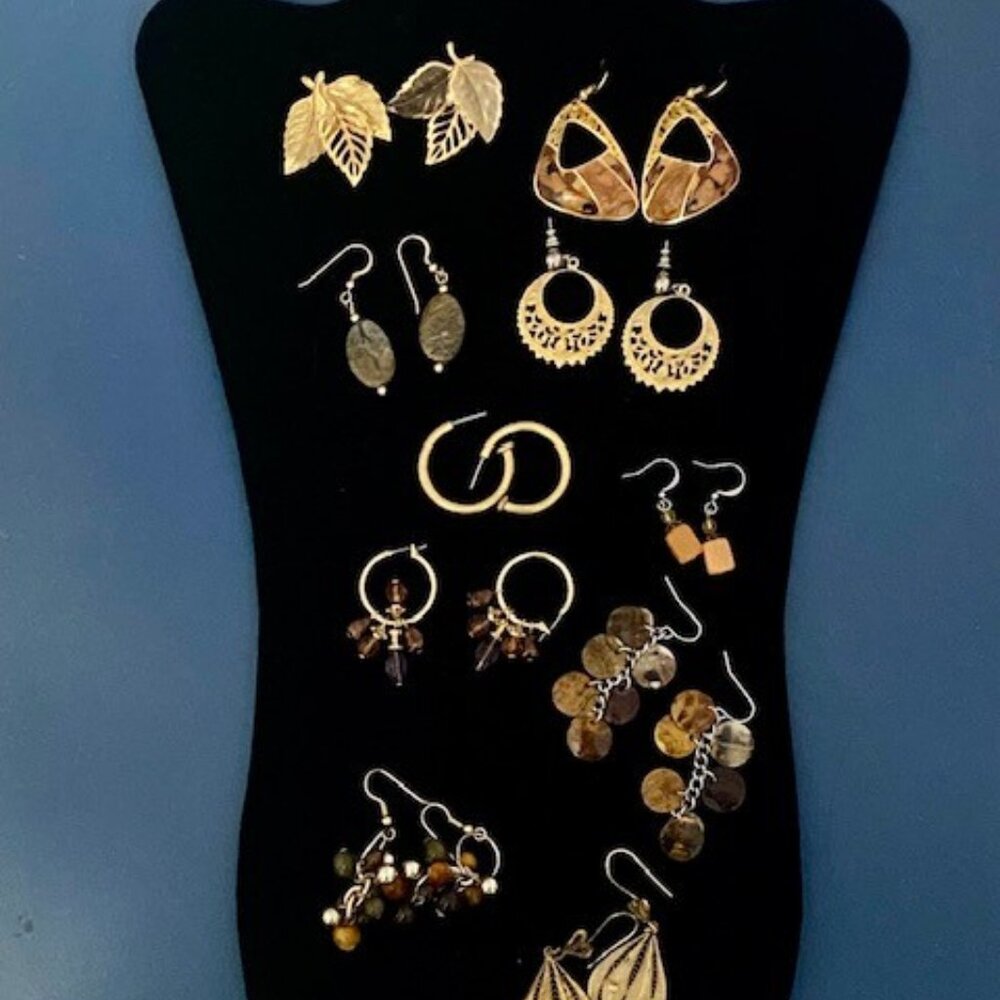 costume jewelry earrings 10 pair in gold tone, amber, and brown